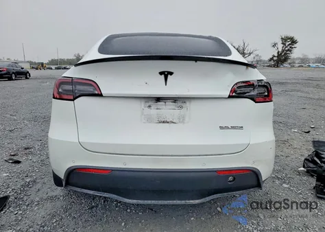 2022 Tesla Model Y from USA, damaged, VIN 7SAYGDEF0NF523775